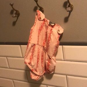 Organic Kate Quinn sleeveless romper.